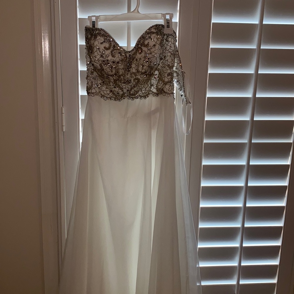 white beaded strapless prom dress